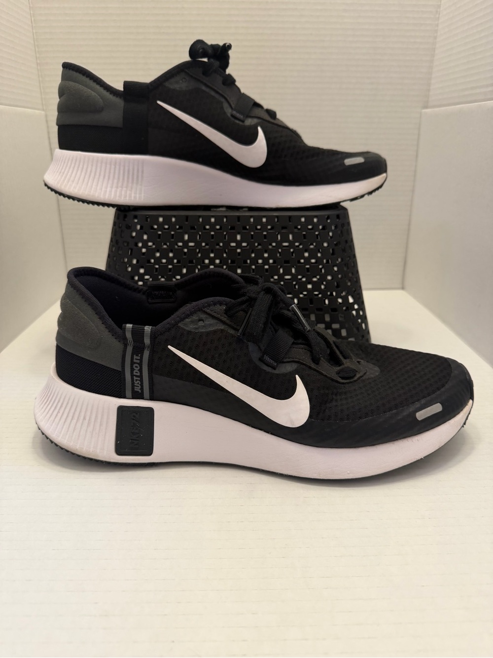 Nike Black and White Athletic Running Shoes with White Swoosh